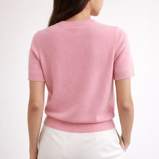 Image of the model showing the back of Rosaline cashmere short sleeve cardigan
