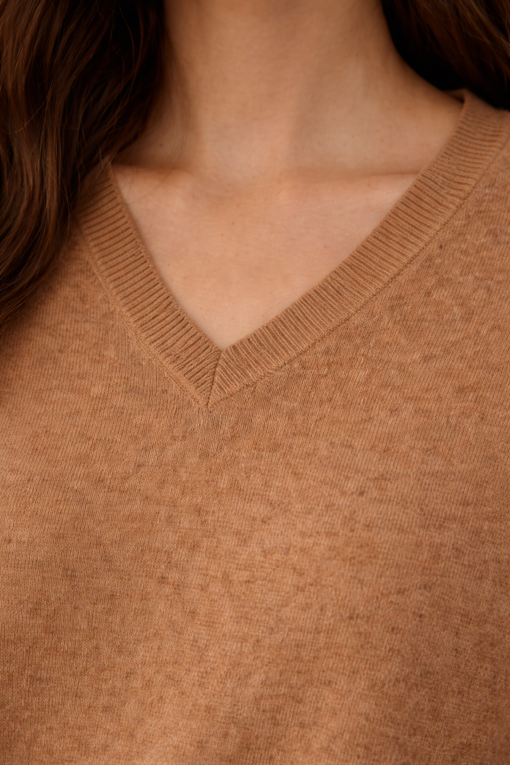 Close up photo of Eva Brown Cashmere V-Neck on the model