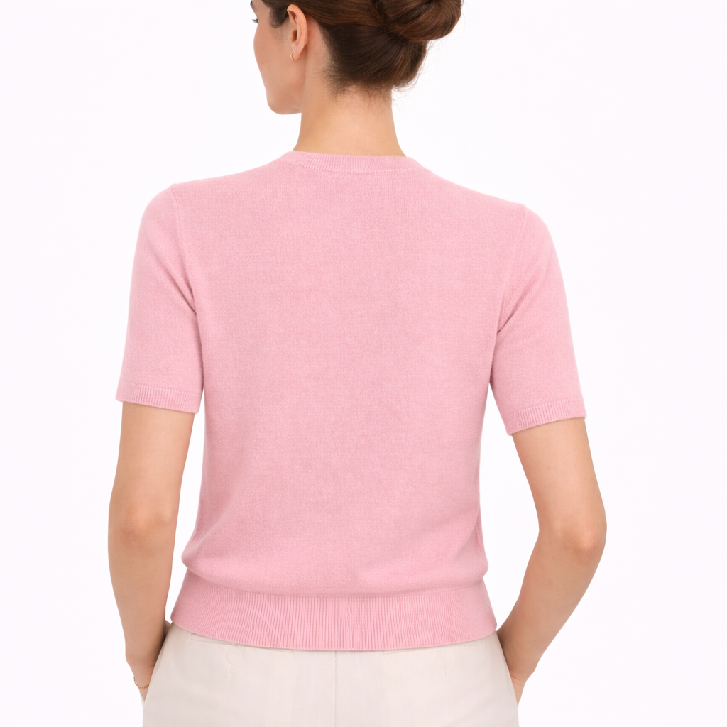 Model wearing Gia Rose cashmere crewneck short sleeve sweater showing the back image 