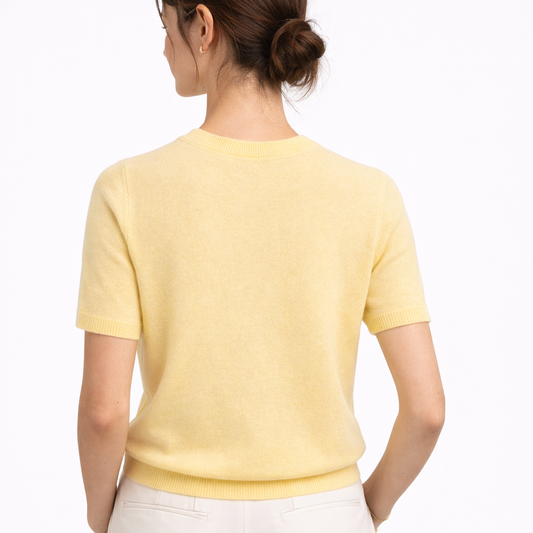 Model wearing Gia Sol Cashmere   Crewneck Short Sleeve Sweater showing the back image